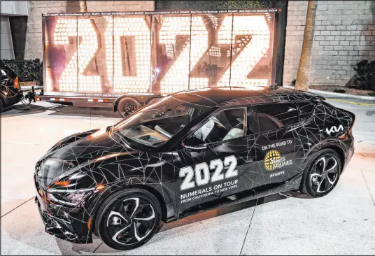  ?? Mark Gerolaguin ?? Towbin Kia hosted Kia America’s “2022 Numerals” tour as the digits made the cross-country trip to New York for Times Square ball drop on New Year’s Eve.