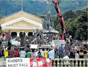 ?? Picture: Esa Alexander ?? Fallists celebrate as the Rhodes statue leaves the University of Cape Town in 2015.