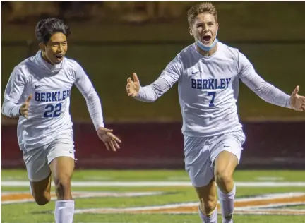  ?? TIMOTHY ARRICK PHOTOS — FOR MEDIANEWS GROUP ?? Berkley’s Grant Hockridge and Mico Rubio celebrate what would be the game-winning goal in a 1-0 win over Grosse Pointe South Tuesday.