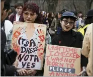  ?? VLADIMIR TRETYAKOV — NUR.KZ VIA AP ?? Women gather for a rally to mark the Internatio­nal Women’s Day March 8 in Almaty, Kazakhstan. One of the main demands that the activists voiced at the rally was the adoption of a law on domestic violence. Internatio­nal Women’s Day on March 8is an official holiday in Kazakhstan.