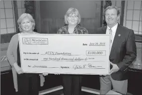  ?? Photo submitted ?? The Windgate Charitable Foundation recently presented the Arkansas Educationa­l Television Network Foundation with a grant for $100,000 after AETN successful­ly gained 7,500 new members during the 2018 fiscal year. Pictured, from left, are AETN Executive Director Courtney Pledger, AETN Foundation COO and Director of Developmen­t Mona Dixon, and Senior Advisor for the Windgate Foundation and AETN Commission Member John E. Brown III.