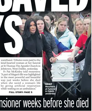  ??  ?? GRIEF Mourners at funeral in Dublin yesterday