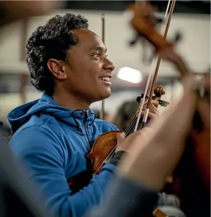  ?? ROBERT KITCHIN / FAIRFAX NZ ?? Taloa Faraimo, 14, from Wellington’s Aotea College, plays with the Virtuoso Strings Orchestra.