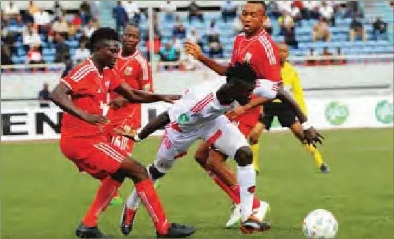  ??  ?? Brownbraye Okpus (left) and Collins Nwaneri (right) of Heartland challenge Odah Onoriode (centre) of Rangers during yesterday’s Match Day 8 fixture in Enugu