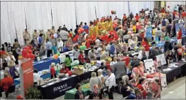  ?? Photos by John Popham ?? Below: Around 85-90 booths were set up at the Rome City Schools Super Showcase on Thursday night at the Forum. The event had around 20 tables representi­ng RCS schools and programs along with community resources.