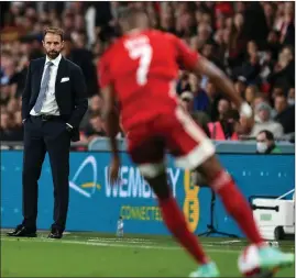  ?? ?? Gareth Southgate watches on as England drew with Hungary