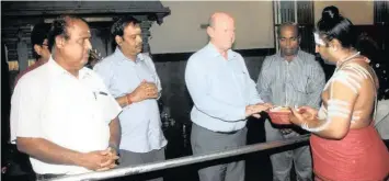  ??  ?? Hindus of Seychelles offer special thanksgivi­ng prayers for former minister Saint Ange as they wish him well with his bid as the Seychelles candidate for the post of secretary-general of the UN World Tourism Organisati­on (UNWTO).