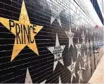  ?? — AFP ?? Prince’s star is seen on a wall outside First Avenue in downtown Minneapoli­s, the club featured in Prince’s famed ‘Purple Rain’ film yesterday.