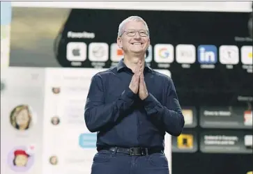  ?? Brooks Kraft Apple ?? THE NEXT iPhone operating system will include an option to put a mask on a personaliz­ed emoji, and software for the Apple Watch will detect when wearers wash their hands. Above, CEO Tim Cook on Monday.