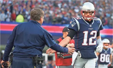  ?? MARK J. REBILAS/USA TODAY SPORTS ?? Tom Brady on coach Bill Belichick, left: “He’s the best for me. ... He maximizes talent.”