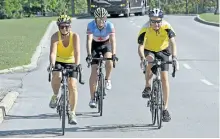  ?? MIKE DIBATTISTA/POSTMEDIA NETWORK ?? Peterborou­gh resident Don Bourne cycled 100 kilometres through Niagara to marked his 80th birthday. Riding along side of him was his wife Becky Bourne and his grandson Andrew Yorke, a triathlete who represente­d Canada at the Rio Olympics.