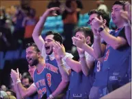  ?? Seth Wenig/Pool / TNS ?? Knicks fans cheer before Game 1 of the first-round playoff series against the Hawks on May 23 in New York.