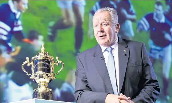  ??  ?? World Rugby chairman Bill Beaumont poses with the Webb Ellis trophy before the announceme­nt of the 2019 Rugby World Cup match schedule in Tokyo this month.