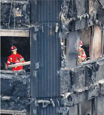  ?? TOLGA AKMEN/AFP/GETTY IMAGES ?? Arconic could be subject to major liabilitie­s as the use of combustibl­e cladding provided to the Grenfell Tower renovation project has become a focal point for investigat­ors in the U.K.