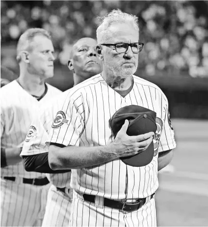  ?? DENNIS WIERZBICKI, USA TODAY SPORTS ?? Manager Joe Maddon says the Cubs will continue to embrace the target placed on them in spring training: “Our guys want to be champions. They openly talk about it. They don’t hide from it.”