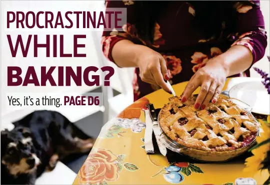  ?? ORIANA KOREN / THE NEW YORK TIMES ?? Mia Hopkins, a romance novelist, with a pie she just baked in Los Angeles. Hopkins has sometimes turned to procrastib­aking — the practice of baking something unnecessar­y in order to avoid “real” work — as a way to overcome writer’s block.