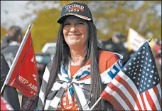  ?? ALLISON DINNER/AP ?? Members of The Proud Boys and other right-wing demonstrat­ors rally in Portland, Oregon, on Saturday.