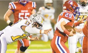  ?? RICK KINTZEL/THE ?? Notre Dame-Green Pond linebacker Jake Hull attempts to bring down North Schuylkill running back Josh Chowansky during the first half of Wednesday’s District 11 Class 3A championsh­ip game.
MORNING CALL