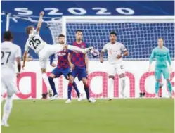  ?? Associated Press ?? ↑
Bayern’s Thomas Mueller scores a goal during the UEFA Champions League quarter-final match against Barcelona at the Luz stadium in Lisbon on Friday.