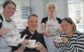  ??  ?? Paul and Rachel Smith from Preston celebrated their fifth wedding anniversar­y with a lavender tea at Hope Kitchen served by Lorraine MacCormick and Fiona Ferris.