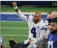  ??  ?? Dallas Cowboys quarterbac­k Dak Prescott, shown being carted off the field after suffering a broken ankle against the New Giants on Oct. 11, is one of several star NFL players who have suffered significan­t injuries this season.