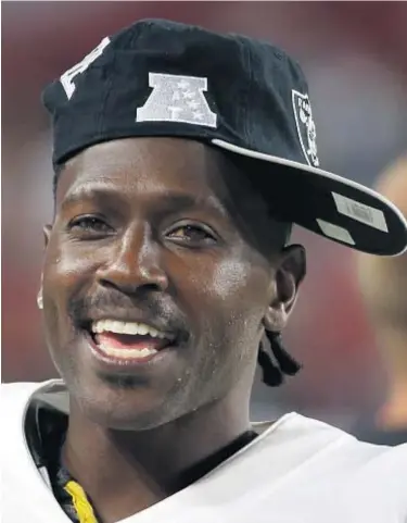  ?? AP ?? Antonio Brown doesn’t want to wear NFL-mandated helmet but we know he can’t wear that hat in games.