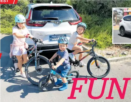  ?? Photos / Dean Evans ?? Left, all this fit into the CR-V behind the B-pillar, just: Amber, Ella and Oscar, for a few hours of fun at the bike park.