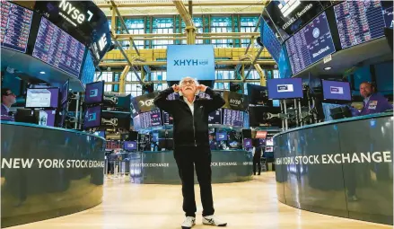  ?? EDUARDO MUNOZ ALVAREZ/AP ?? Trader Peter Tuchman works Monday on the floor at the New York Stock Exchange.