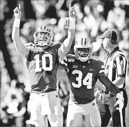  ?? IAN MAULE/AP ?? Kansas State QB Skylar Thompson celebrates after Thompson’s score during Saturday’s upset of Oklahoma.