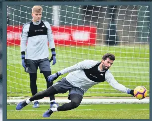  ??  ?? UNBEATABLE Alisson has had a big hand in improving Liverpool’s defensive record