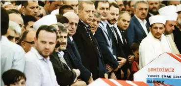  ??  ?? Turkish President Recep Tayyip Erdogan (C) and former Turkish president Abdullah Gul (C-R) attend the funeral of a victim of the coup attempt in Istanbul yesterday. Photo: AFP.