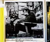  ?? ?? Curtiss and Tom Waits in a 1973 photo on the wall at Folk Arts Rare Records in Normal Heights.