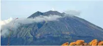  ?? - File photo ?? NO EVACUATION ORDERED: Mount Agung volcano is seen from Kubu village which is few kilometres from the crater of Mount Agung volcano in Karangasem, Bali, Indonesia.