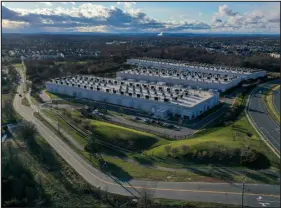  ?? NATHAN HOWARD — THE NEW YORK TIMES ?? Data centers in Ashburn, Va., on March 10. At least 75data centers have opened in Virginia since 2019.