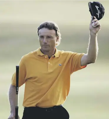  ??  ?? 0 Bernhard Langer acknowledg­es the crowd during the 2005 Open Championsh­ip in St Andrews.