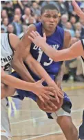  ?? JOHN KLEIN / FOR THE JOURNAL SENTINEL ?? Destiny’s Zachary Markland fights for a rebound against Whitnall in a game earlier this season. Destiny is 19-1 with one game left in the regular season.