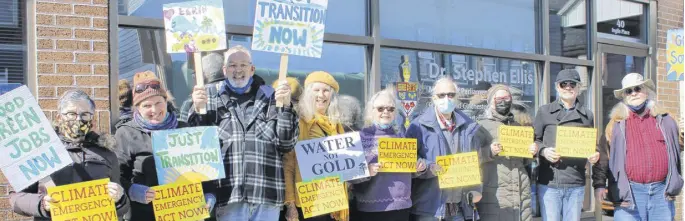  ?? CHELSEY GOULD PHOTOS ?? The North Shore group of the Canadian Council of Canadians met outside Cumberland-colchester MP Dr. Stephen Ellis' Truro office on March 11.