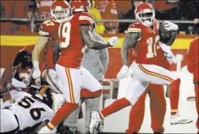 ?? CHARLIE RIEDEL/THE ASSOCIATED PRESS ?? Chiefs wide receiver Tyreek Hill (10) blazes for a 70-yard touchdown run against the Broncos on Dec. 26 at Kansas City, Mo. Hill, a rookie receiver/return specialist, might be the most exciting player in the NFL.