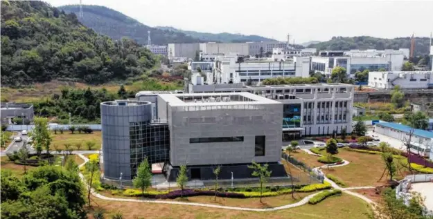  ?? HECTOR RETAMAL/GETTY IMAGES VIA BLOOMBERG ?? A portion of the Wuhan Institute of Virology, one of several research labs in the Chinese city.