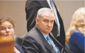  ?? Gabriel Christus, for The Daily Sentinel ?? Michael Blagg listens as the guilty verdicts are read at the Jefferson County courthouse in Golden on Thursday. He was convicted of killing his wife, Jennifer, in 2001 and dumping her body in a trash bin.