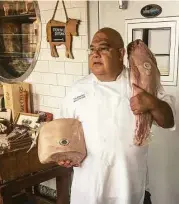  ??  ?? Tommy Elbashary of B&B Butchers prepares rib-eye and sirloin cuts of Kobe beef.