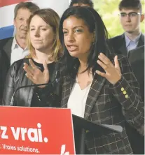  ?? JACQUES BOISSINOT/THE CANADIAN PRESS ?? Quebec Liberal Leader Dominique Anglade gestured to her party candidates at a news conference Wednesday, saying “Are these not people who contribute to Quebec?”