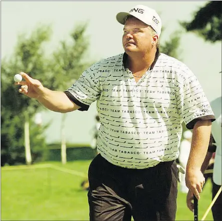  ?? LES BAZSO/PNG FILES ?? Guy Boros waves to the crowd at the 18th hole in 1998 during the Greater Vancouver Open at Northview Golf & Country Club. Boros was the winner of the inaugural GVO in 1996 at Northview.