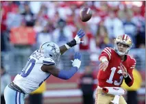  ?? RAY CHAVEZ — BAY AREA NEWS GROUP ?? Niners quarterbac­k Brock Purdy (13) is among three finalists for the Associated Press' NFL Offensive Rookie of the Year honor.