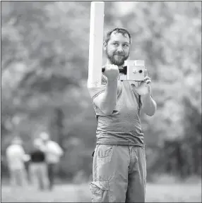  ?? Staff photograph by Jason Ivester ?? Matthew Fenno with the Southeast Archaeolog­ical Center of the National Park Service in Tallahasee, Fla., used a magnetic gradiomete­r at the site of the Leetown hamlet at the Pea Ridge National Military Park. The grassy clearing seen today was once the...