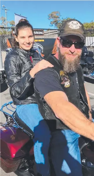  ??  ?? Brooke Kaluzyn and Stuart Love prepare for the annual Ride For Love, which raises money for the Childhood Cancer Support services.