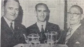  ??  ?? A shot from 50 years ago, Mr B O’Hare, Drogheda postmaster, presenting a silver tea service to Matt Davis who recently retired and centre, Mr M Eagleton.