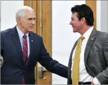  ?? TIMOTHY D. EASLEY / ASSOCIATED PRESS ?? Vice President Mike Pence, left, speaks with Papa John’s Pizza founder John Schnatter before addressing a group of business owners to gather support for the repeal and replacemen­t of the Affordable Care Act at the Harshaw Trane Parts and Distributi­on...