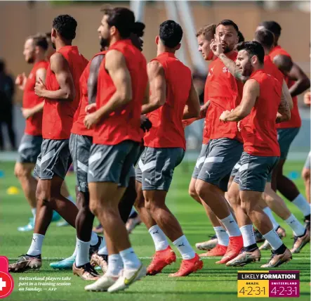  ?? ?? Switzerlan­d players take part in a training session on Sunday. — afp