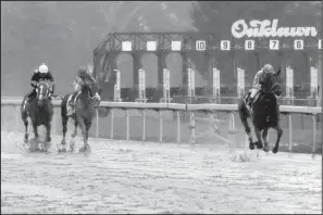  ?? AP/DANNY JOHNSTON ?? American Pharoah and Victor Espinoza won the Rebel Stakes by a comfortabl­e margin Saturday at Oaklawn Park.